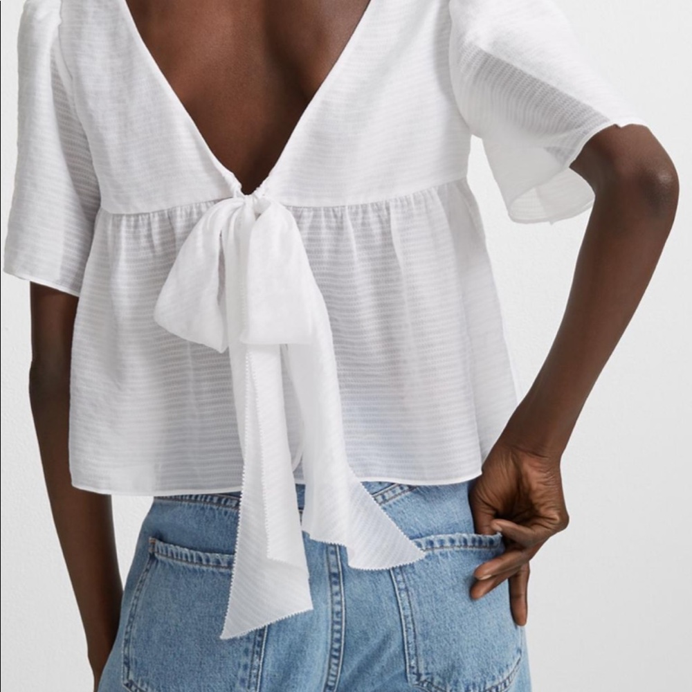 White blouse with tie in back